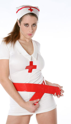 Sexy busty babes in latex nurse uniforms caressing their smooth bodies